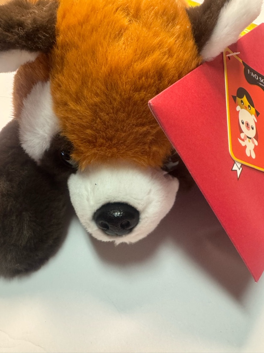 FAO Schwarz Brown and White Plush Raccoon